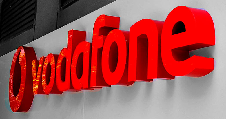 Illuminated sign for Vodafone Spain stores.