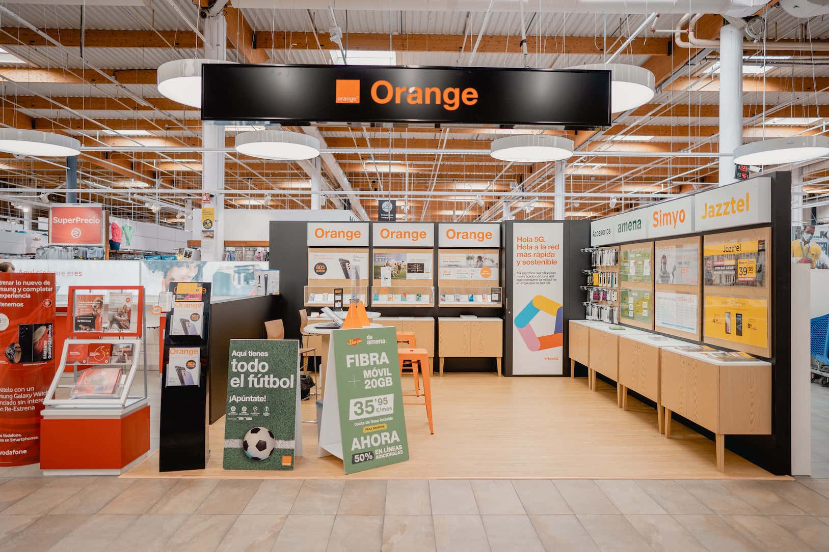 Manufacturing and installation of furniture display for Orange in commercial space by INSTORE.